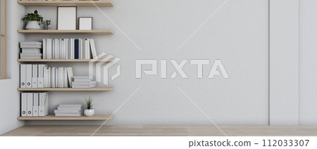 A front view of a modern empty room features a white wall, parquet floor, and wall bookshelves. 112033307
