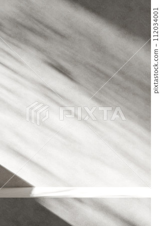A background rich in shading that you can use in your designs. Textured walls and podium with sunlight shining through. A background rich in shading that you can use in your designs. Textured walls and podium with sunlight shining through. 112034001