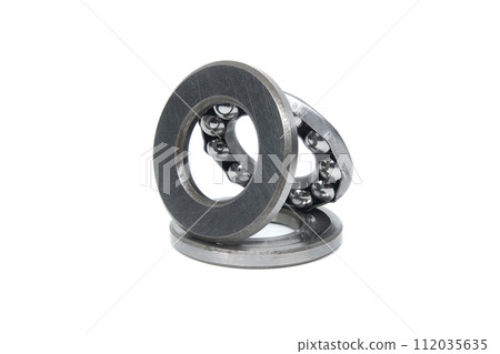 Thrust ball bearing isolated on white background Thrust ball bearing isolated on white background 112035635