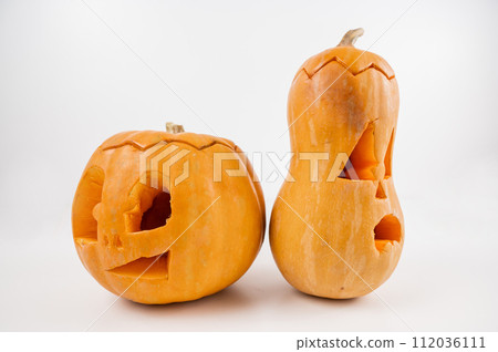 Two Jack-o-lantern on a white background. Halloween decoration. 112036111
