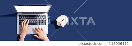 Laptop computer with piggy bank 112036511