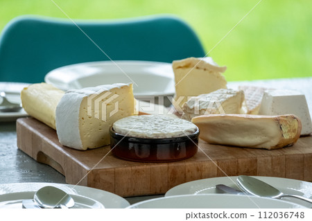 Artisan Cheese Selection on Wooden Board 112036748