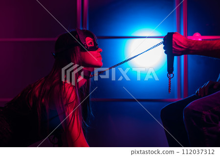 A woman is kneeling in front of a man. Role-playing games. 112037312