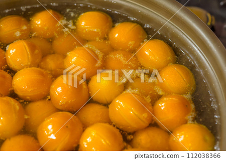 How to make delicious candied kumquats: Washing with water, Fukikoboshi, Candied stew How to make delicious candied kumquats: Washing with water, Fukikoboshi, Candied stew 112038366
