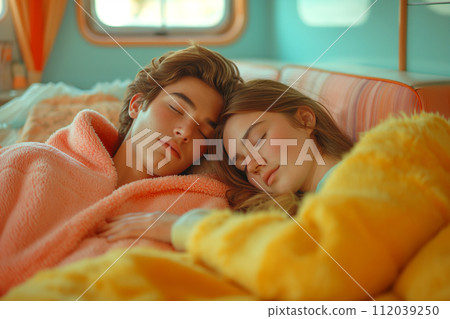 Husband and wife sleeping in bed in room in pastel coloured room 112039250