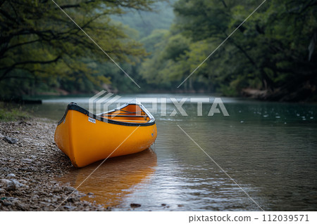 Kayak on the bank of a mountain river in the forest. 112039571