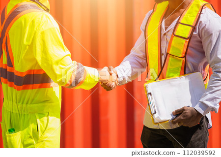 Worker hand shaking together. Engineer team join deal projects cooperated handshake in logistics industry Worker hand shaking together. Engineer team join deal projects cooperated handshake in logistics industry 112039592