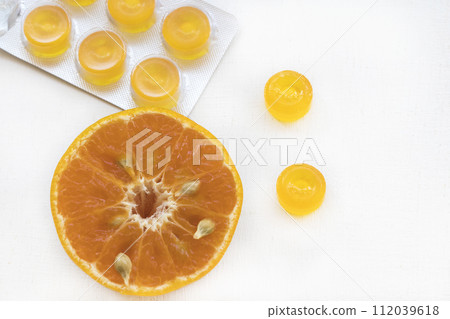 cough sore throat pastille extract orange fruits arrangement flat lay style  112039618