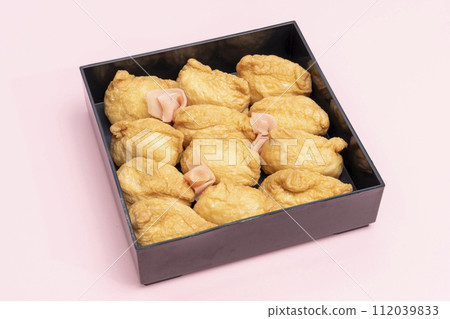 Inari sushi double box pink background Inari sushi double box pink background 112039833