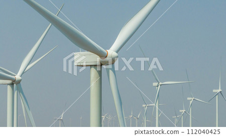 Wind farm or wind park, with high wind turbines for generation electricity, Green ecological power energy generation, Wind farm eco field. 112040425