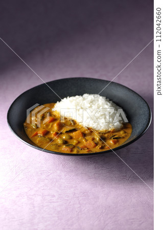 Curry rice with plenty of vegetables such as pork, pumpkin, and carrots. Curry rice with plenty of vegetables such as pork, pumpkin, and carrots. 112042660
