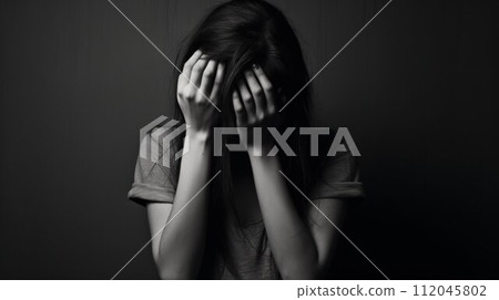 Portrait of crying woman covering her face with her hands. Depression and tears, bad mood, concept of problems Portrait of crying woman covering her face with her hands. Depression and tears, bad mood, concept of problems 112045802