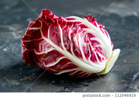 Radicchio rosso lettuce isolated on white background. Fresh green salad leaves from garden 112046919
