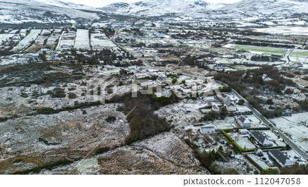 Aerial view of a snow covered Ardara in County Donegal - Ireland 112047058