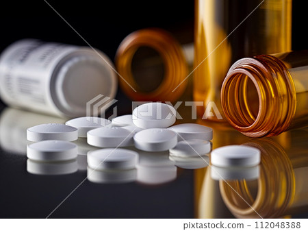 Opioid, Oxycodone prescription pills spilled onto a table with bottles in the background. Addiction prescription pain killer tablets. Ai Generative image 112048388