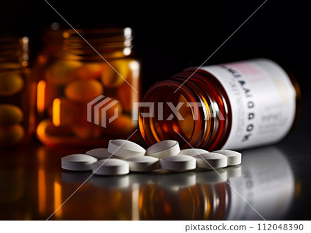 Opioid, Oxycodone prescription pills spilled onto a table with bottles in the background. Addiction prescription pain killer tablets. Ai Generative image 112048390