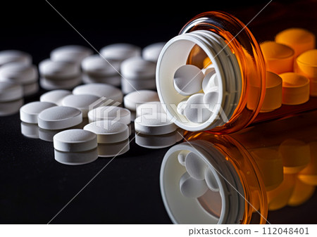 Oxycodone, Opioid prescription pills spilled onto a table. Addiction prescription pain killer tablets. Ai Generative image 112048401