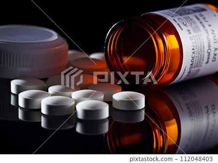 Oxycodone, Opioid prescription pills spilled onto a table. Addiction prescription pain killer tablets. Ai Generative image 112048403