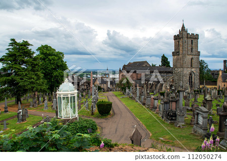 View on old church and grave yard in Stirling, Scotland, Great Britain under the dark sky. 112050274