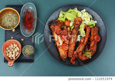 Stewed pork ribs in sauce. Stewed pork ribs in sauce. 112051974