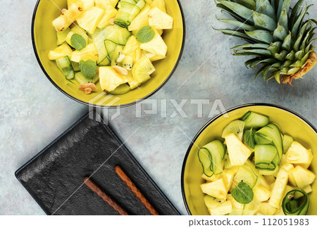Fresh vegan salad with pineapple. Fresh vegan salad with pineapple. 112051983