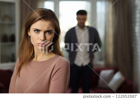 portrait of offended sad woman ignoring her her husband 112052087
