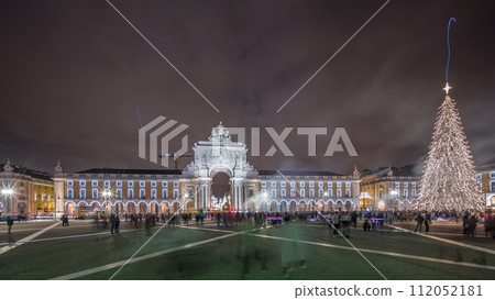 Panorama showing Commerce square illuminated and decorated at Christmas time in Lisbon night timelapse. Portugal Panorama showing Commerce square illuminated and decorated at Christmas time in Lisbon night timelapse. Portugal 112052181
