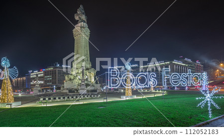 Panorama showing the Marques de Pombal square with monument and Christmas lights night timelapse. Lisbon, Portugal 112052183