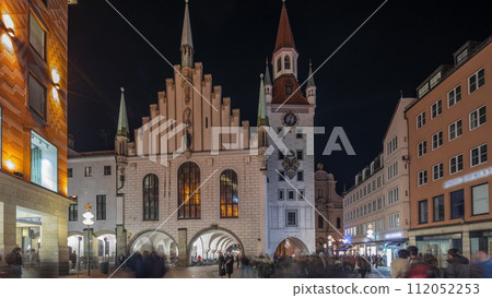Marienplatz with the old Munich town hall and the Talburg Gate night timelapse hyperlapse, Bavaria, Germany. 112052253
