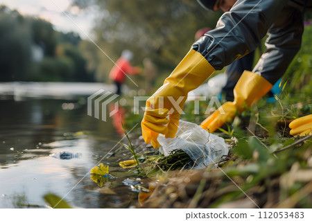 AI-generated content. Environment concept - a litter clean-up event with people collecting litter, closeup, summertime, forest AI-generated content. Environment concept - a litter clean-up event with people collecting litter, closeup, summertime, forest 112053483