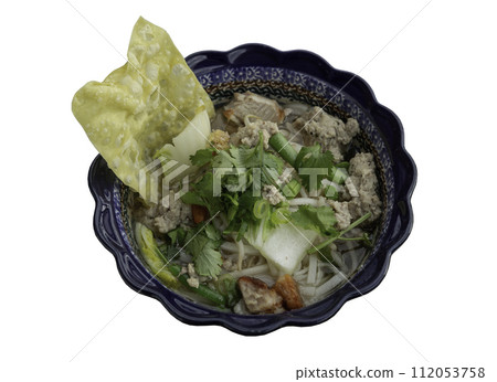 Rice stick noodles soup topped with Minced pork, Crispy pork, Fried wontons, Chinese cabbage, Yard long beans, Bean sprout and Coriander in Ceramic bowl isolated on white background with clipping Rice stick noodles soup topped with Minced pork, Crispy pork, Fried wontons, Chinese cabbage, Yard long beans, Bean sprout and Coriander in Ceramic bowl isolated on white background with clipping 112053758