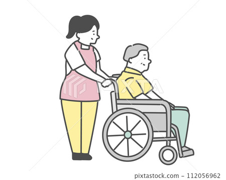 A female caregiver and an elderly man in a wheelchair 112056962