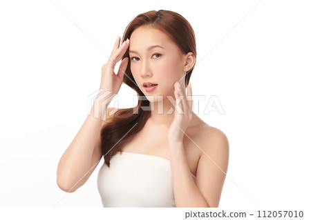 Beautiful young asian woman with clean fresh skin on white background, Face care, Facial treatment, Cosmetology, beauty and spa, Asian women portrait. 112057010