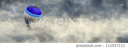 Serene Ascent: Hot Air Balloon Drifting Above a Sea of Clouds 112057112