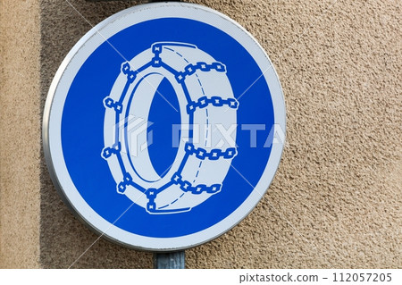 Snow chains road sign in France 112057205