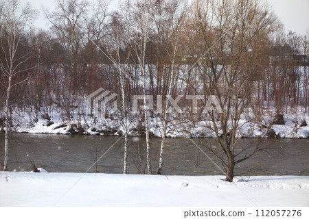 Asahikawa in winter seen from the embankment near Ishikari River [Asahikawa, Hokkaido] 112057276