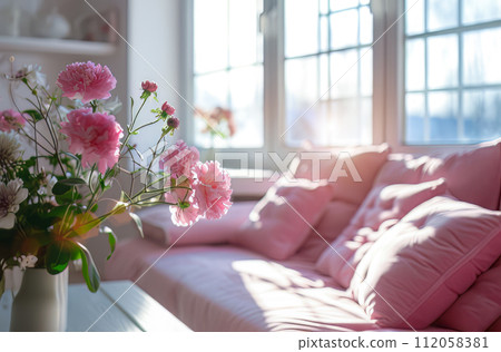 Romantic bedroom with candles and light, pastel pink colors 112058381