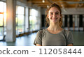 Yoga instructor in class for flexible yoga poses and mindful spiritual meditation relaxation 112058444