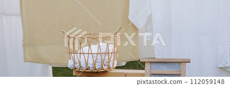Banner laundry drying in garden setting. Banner laundry drying in garden setting. 112059148