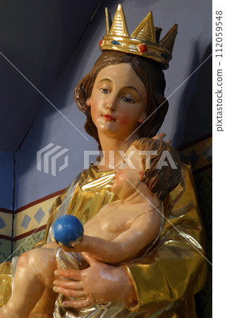 Virgin Mary with baby Jesus, statue on the altar of Our Lady in the Parish Church of the Holy Cross in Zacretje, Croatia Virgin Mary with baby Jesus, statue on the altar of Our Lady in the Parish Church of the Holy Cross in Zacretje, Croatia 112059548
