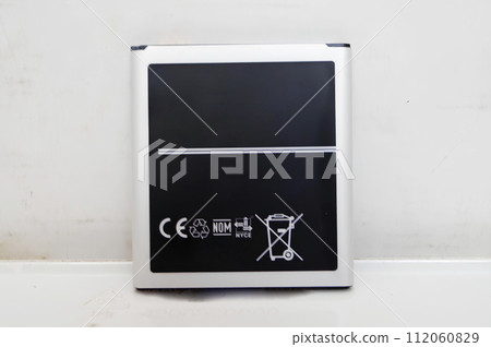 Modern Wall-Mounted Digital Tablet Display in a Clean White Interior 112060829