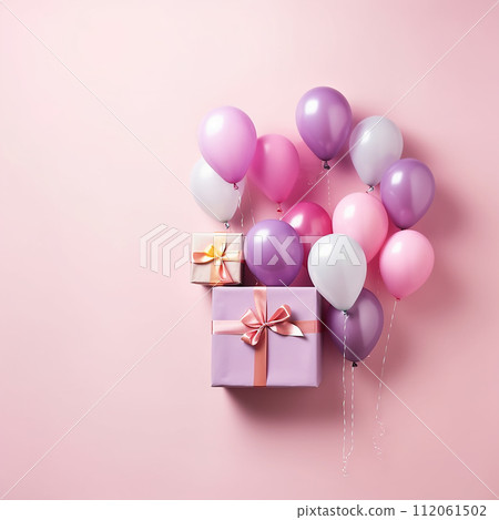 gift boxes with pink ribbons on a background 112061502