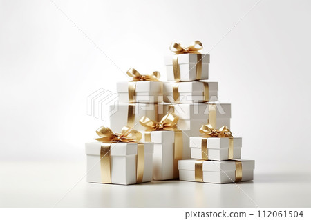 gift boxes with golden ribbons on a pale background gift boxes with golden ribbons on a pale background 112061504