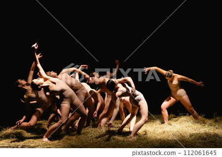 Group of modern ballet dancers. Contemporary art. Young flexible athletic men and women. Group of modern ballet dancers. Contemporary art. Young flexible athletic men and women. 112061645