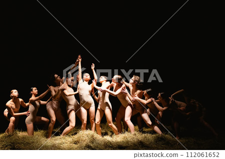 Group of modern ballet dancers. Contemporary art. Young flexible athletic men and women. Group of modern ballet dancers. Contemporary art. Young flexible athletic men and women. 112061652