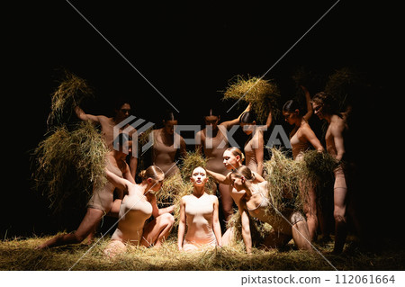 Group of modern ballet dancers. Contemporary art. Young flexible athletic men and women. 112061664