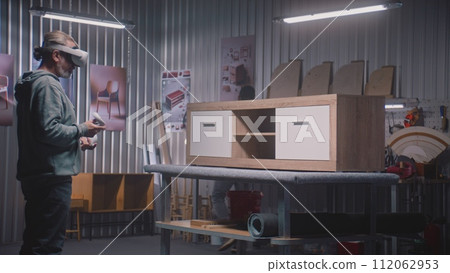 Furniture developer engineer uses virtual reality 112062953