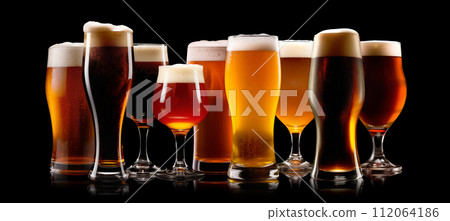 Set of Beer glasses on a black background. Mugs with drink like Ipa, Pale Ale, Pilsner, Porter or Stout Set of Beer glasses on a black background. Mugs with drink like Ipa, Pale Ale, Pilsner, Porter or Stout 112064186
