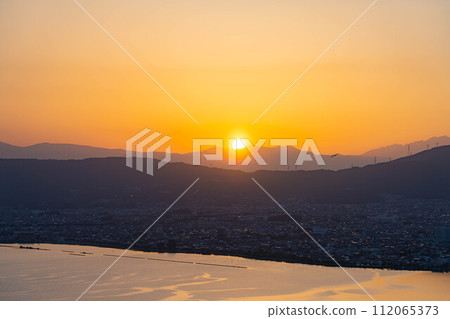 [Sunset material] Sunset seen from Tateishi Park [Nagano Prefecture] 112065373