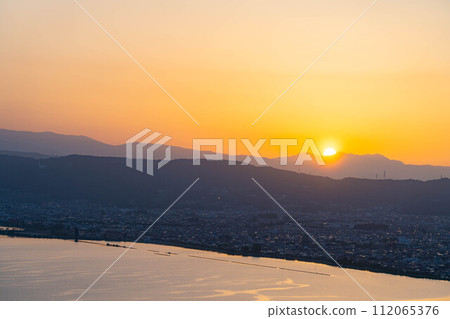 [Sunset material] Sunset seen from Tateishi Park [Nagano Prefecture] 112065376